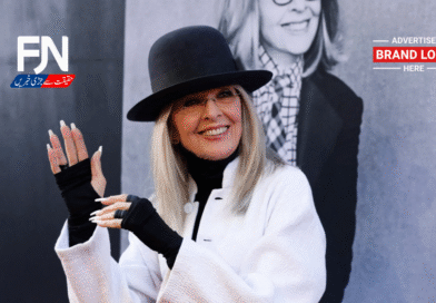 Oscar-winning actress Diane Keaton smiling in her iconic wide-brimmed hat at a Hollywood event